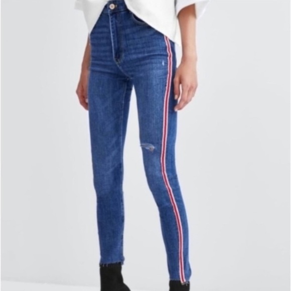 white jeans red stripe